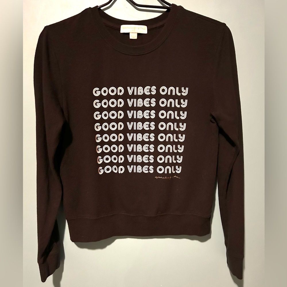good vibes only sweater fits like a small